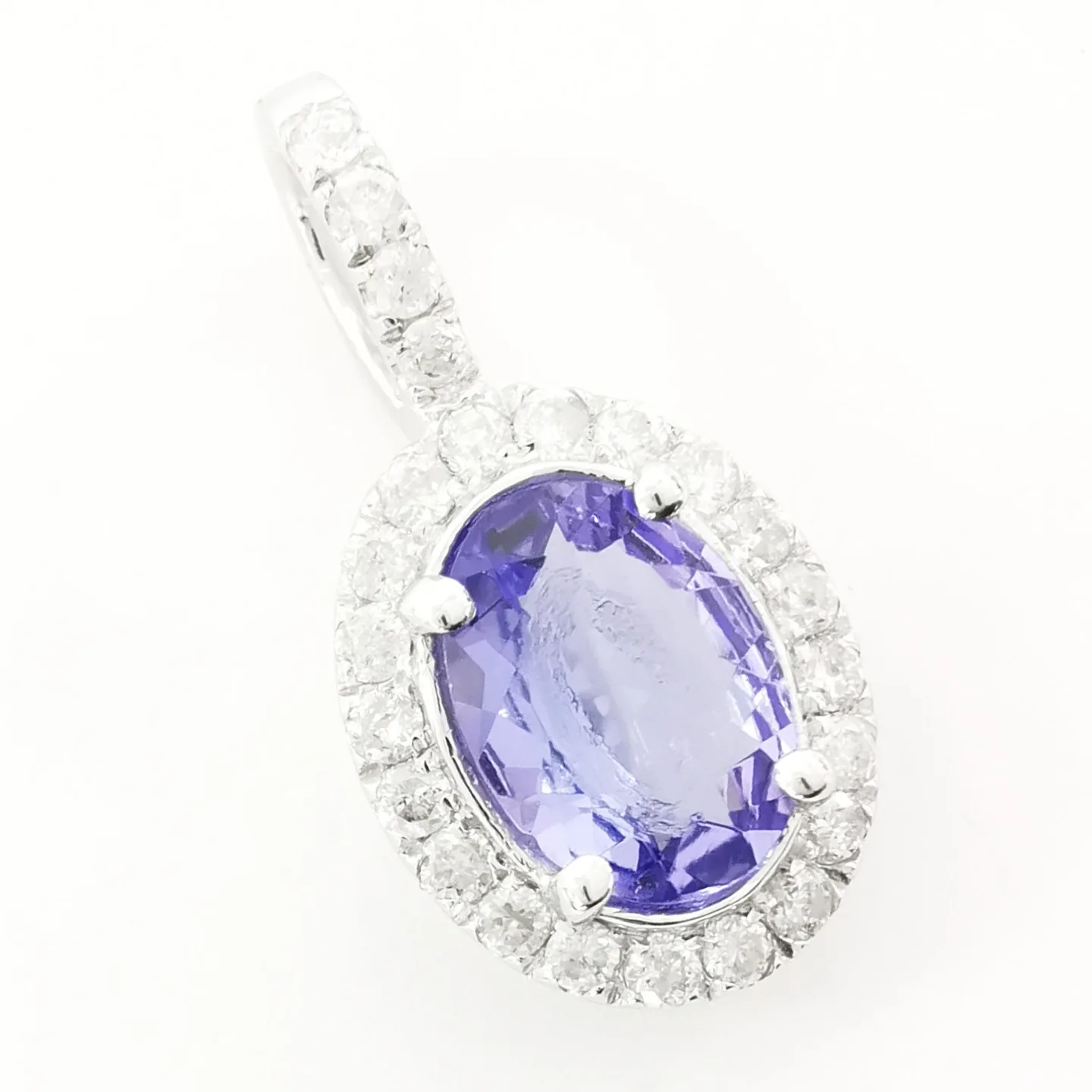 Pendant in white 14ct gold with 1,00ct Tanzanite and 0,25ct natural Diamonds